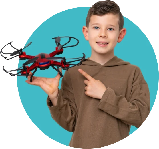 boy holding drone